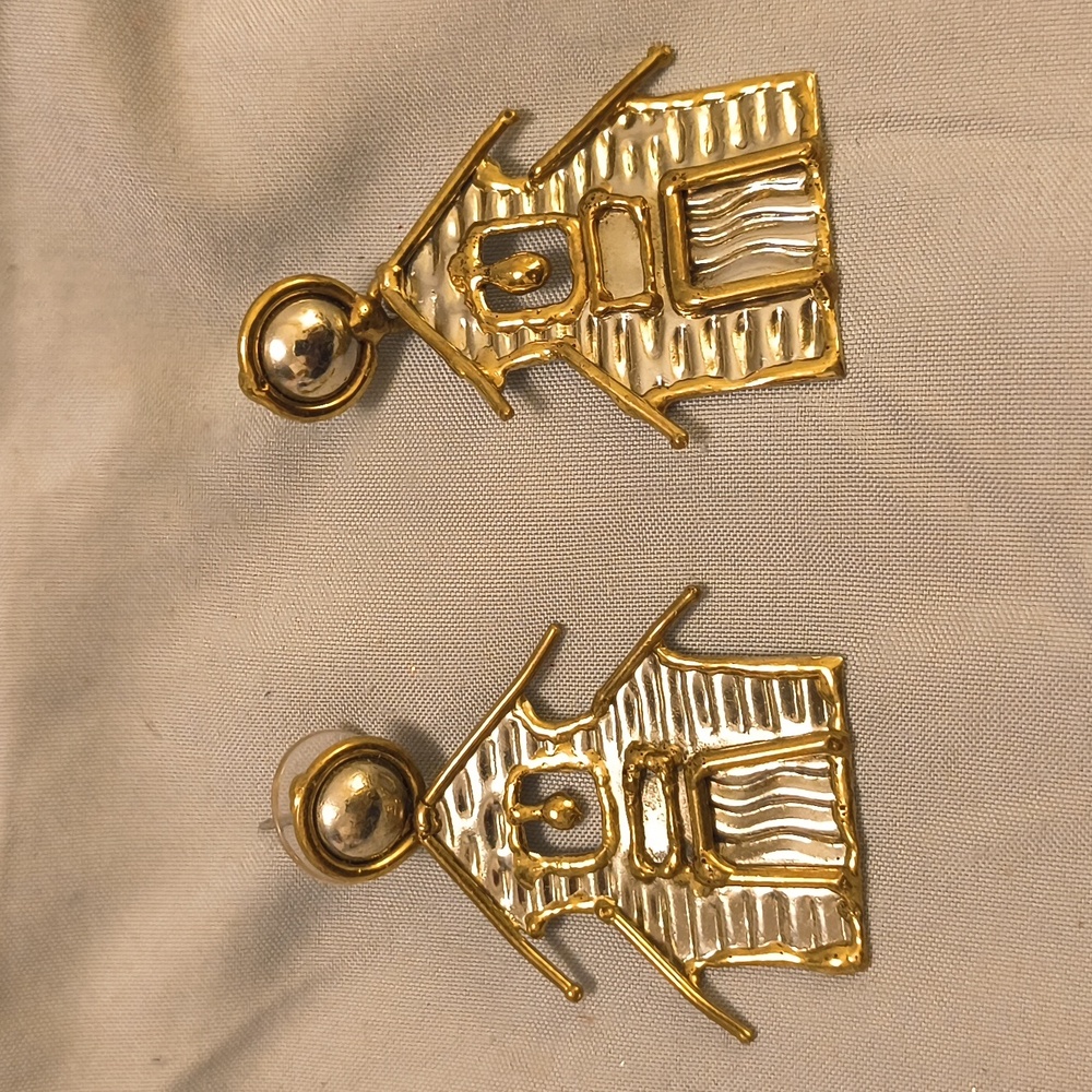Earrings that are shaped like a old-time schoolhouse. Handmade.